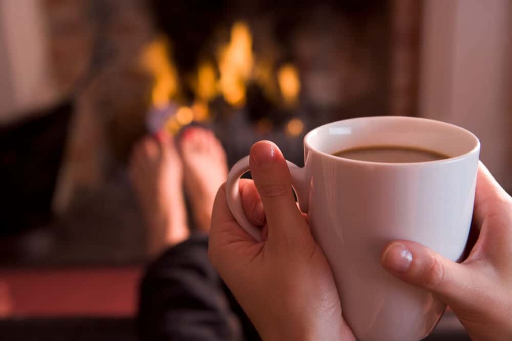 Most productive week, having a cup of coffee in front of the fireplace.